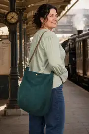 Woman carrying leather bag model Iris L Art. 26058, unique piece, made on La Palma, Canary Islands, Spain, Europe