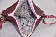 Sam flex M aus semianilin gefärbtem Nappa-Rindsleder in aubergine
