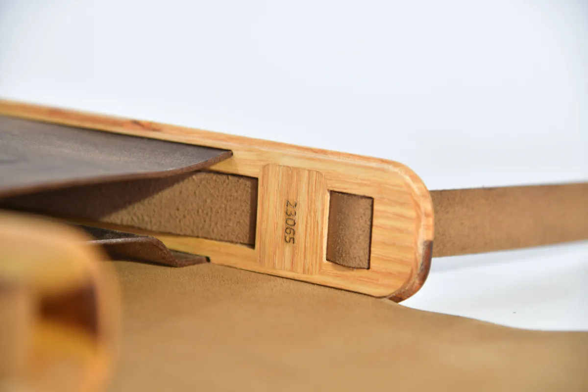 Bernd XS from smoothed, antique water buffalo full-grain leather in dark brwon with elaborate inlays and closure in Gorse wood from La Palma and ash wood