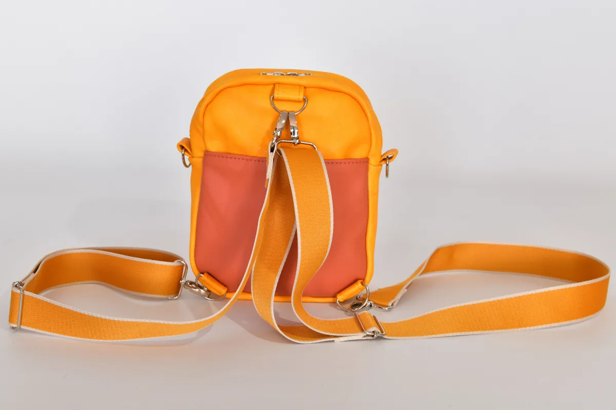 Adrian flex M aus vollnarbigem, pflanzlich softem Rindsleder in gelb und Nappa-Wasserbüffelleder in pastelorange