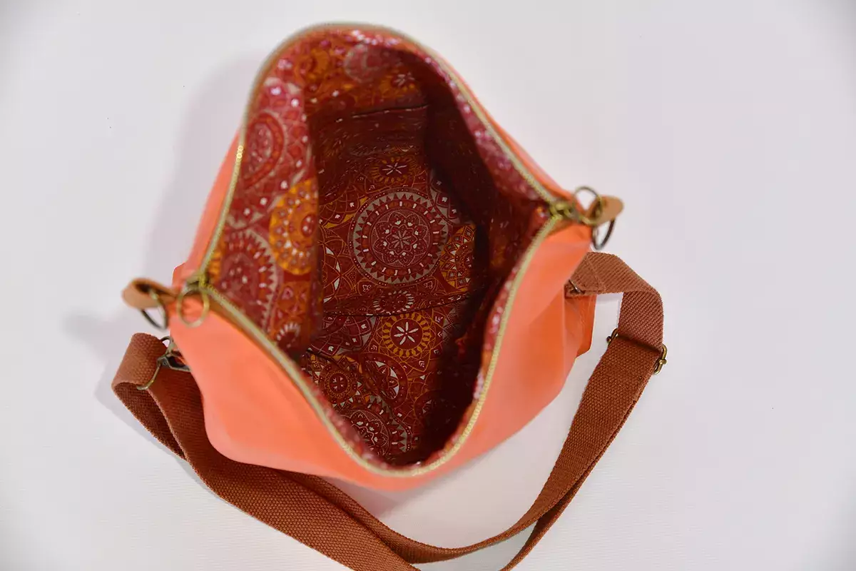 Schultertasche Sam flex Rindsnappaleder lachs