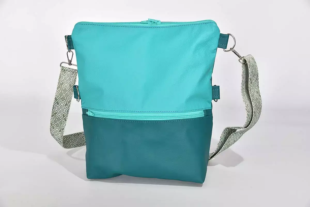 Schultertasche Sam flex Rindsleder türkis und dunkeltürkis