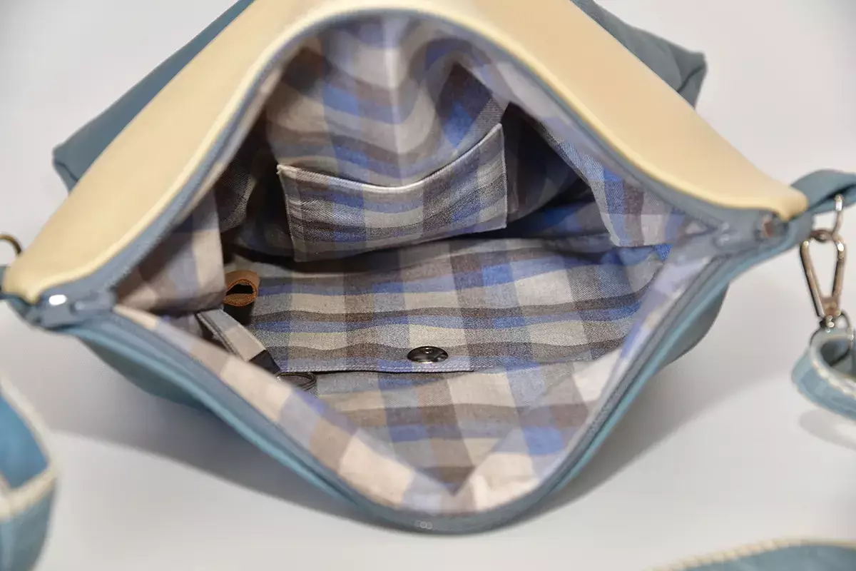 Handgefertigte Ledertasche in lagune und creme Sam flex